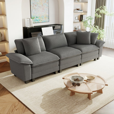 Gray corduroy sectional sofa in a living room