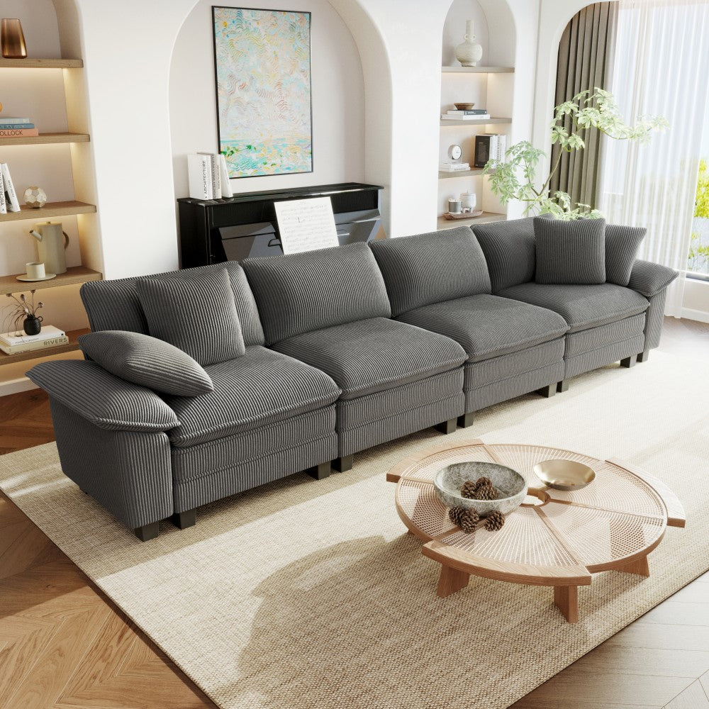 Gray corduroy sectional sofa in a modern living room.
