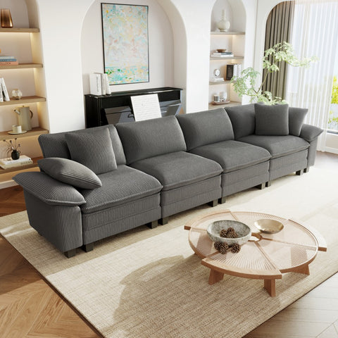 Gray corduroy sectional sofa in a modern living room.