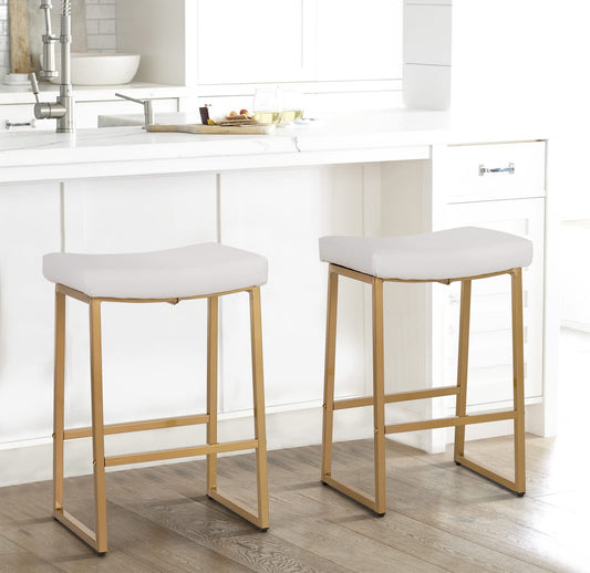 Discover modern elegance with our bar stools featuring a golden metal frame and PU leather. Experience ultimate comfort with high-density foam and a skin-friendly matte fabric cushion, all supported by a stable saddle design for lasting durability.