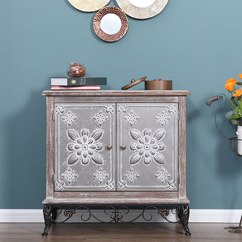 Elevate your living space with our accent cabinet, boasting an exquisite silver floral metal design for added elegance, generous storage, and versatile placement in your home.